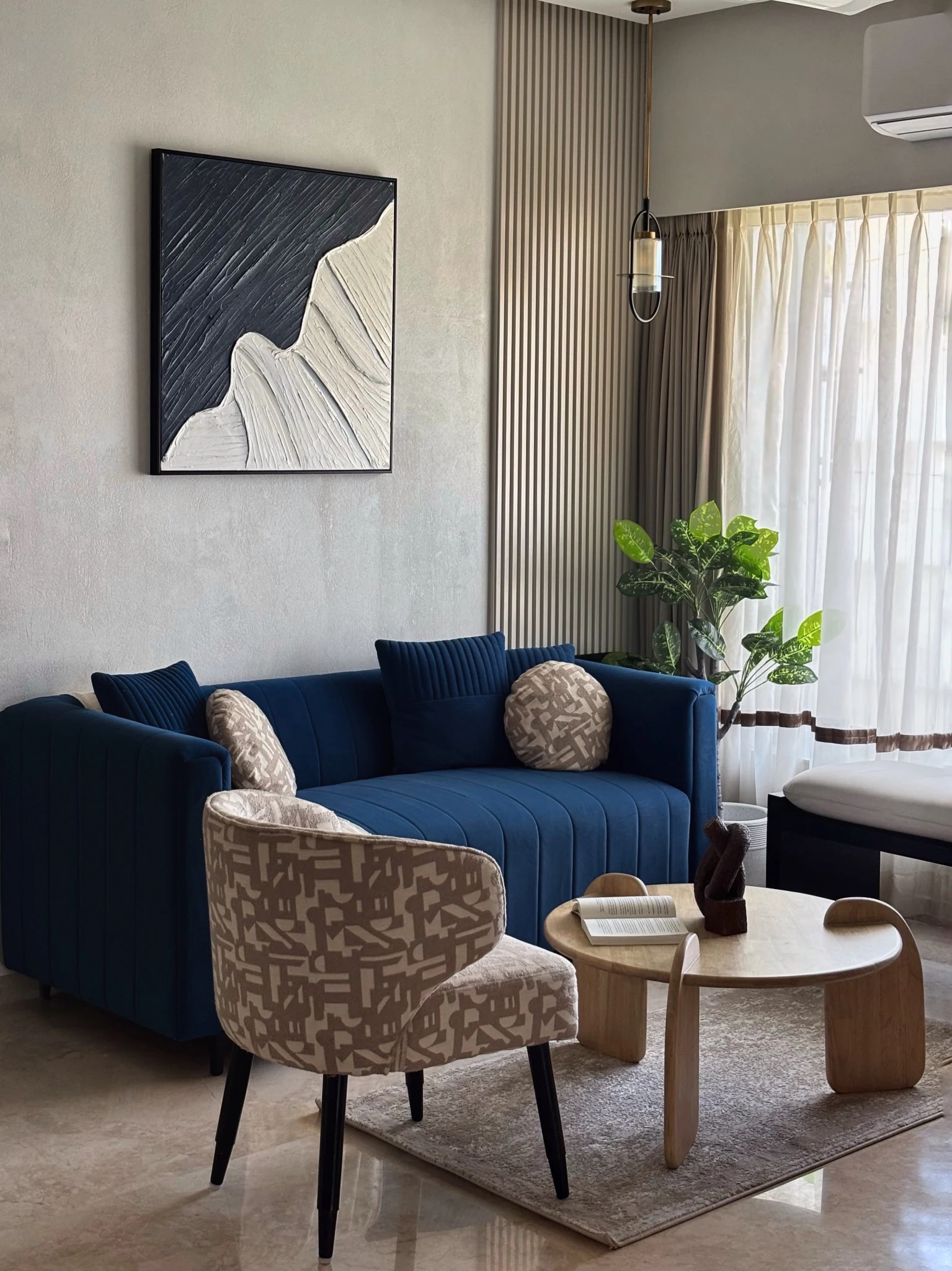 The Oat House living room in Santacruz, designed by Sakshi Jain Studio
